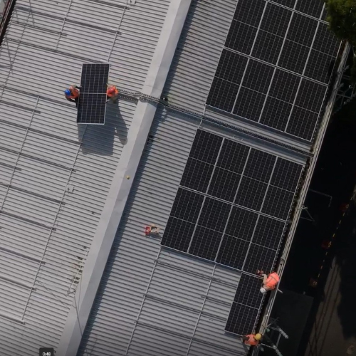 Commercial building roof with solar panels