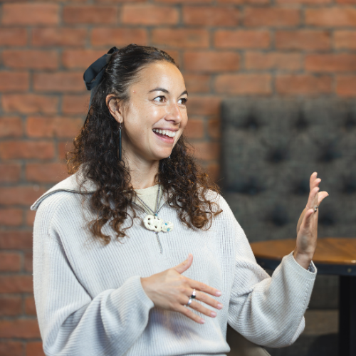 Māori woman smiling at interviewer